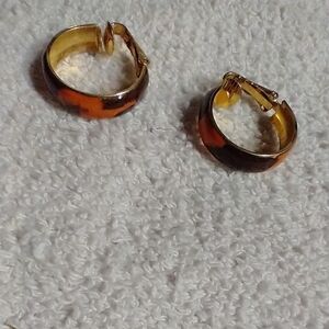 Goldtone orange brown hoop clip earrings
